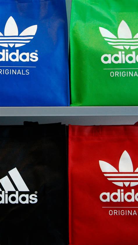 Adidas is investigating allegations of embezzlement .